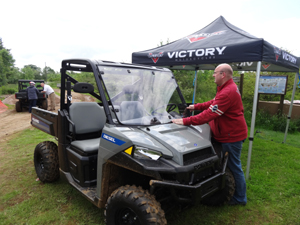 Demonstrating the quick attaching windscreen and roof on the Brutus