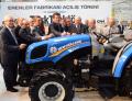 CNH Industrial CEO Richard Tobin (far left) and Chairman of the Board of Koç Holding, Mustafa V. Koç (third from right), sign a New Holland tractor that will be manufactured at the second CNH Industrial and Koç Holding joint venture manufacturing plant in Turkey