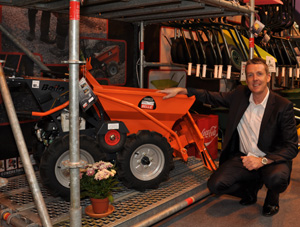Belle's Daniel Pinder with a light transporter and snow-plough construction machine