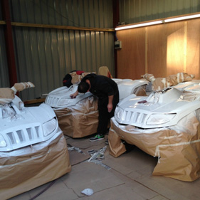 The vehicles had to be painted white