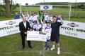 Briggs & Stratton's Ian Small with the winners of this year's Pitch To WIn competition South Newton & Wishford FC