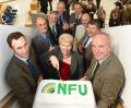Former County Chairmen with the anniversary cake at the Essex NFU Centenary celebration held at the New Holland tractor plant in Basildon. L to R James Hawkes, Jonathan Dixon Smith, John Jolly, Dan Squier, Rosemary Padfield, Richard Matthews, Robert Stacey, Tim Sell and Patrick Wreathall