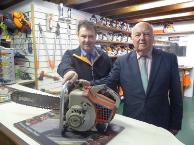 Graham and Charles with the first Stihl saw sold in 1964