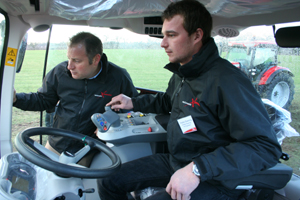 Colin Catley (left) of Leics-based Catley Engineering and Charles Downing of Andrew Downing Agricultural Engineers, Gorefield near Wisbech,Cambs try out the integrated joystick control for McCormick MPower loaders