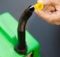 Spout adaptors on portable petrol containers are not a legal requirement