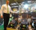 Handy md Simon Belcher with a display of Webb mowers