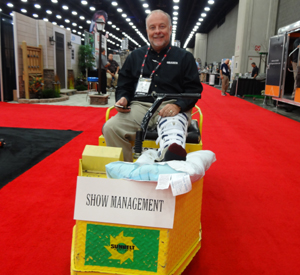 Show organiser, Warren Sellers, had a knee injury and was whizzing round the show floor on an electric vehicle