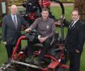 Jonathan Wood, course manager, seated, with Ray George from Oakleys Groundcare to his left and Lely's John Pike