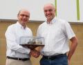 Philip O’Hara (right) receives the CLAAS Tractor Sales Growth Award from Gilles Mayer