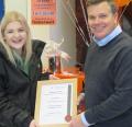 Winner Amy Prentice receives her prize from Guy Marshlain, Timberwolf Marketing Director