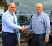 Kubota Business Development Manager, Rob Edwards shaking hands with Highwood Operations Director, Nick Green confirming their appointment as a Kubota tractor dealer for Dorset and Somerset