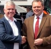 L-R: Dave Roberts Kubota UK md, shakes hands on the deal with Andrew Connon, Dealer Principal at A M Phillip