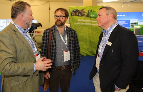 Richard Tyrrell (left) and David Withers (right) of Iseki UK chatting to Service Dealer editor Steve Gibbs