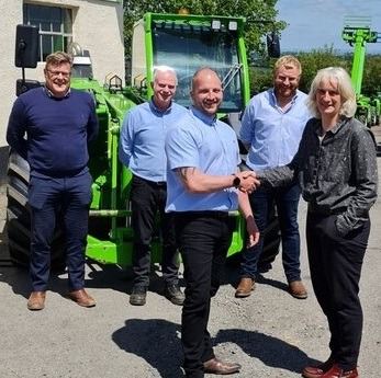 Tom Banbury, managing director of South West Handling (front left) and Louise Winsor, sales manager of South West Handling (front right) with South West Handling team Craig Boxall, Paul Bromhead and Robert Drew