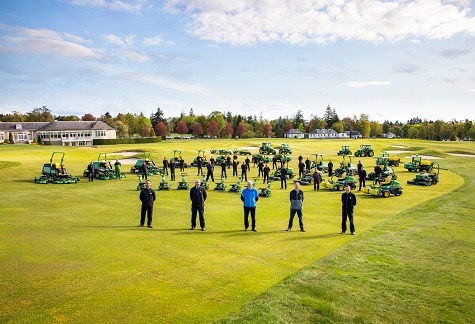 Scott Fenwick, Craig Haldane (front centre & right) and members of Gleneagles’ greenkeeping and gardens team with John Deere and dealer Double A staff on the 18th fairway of The King’s Course.