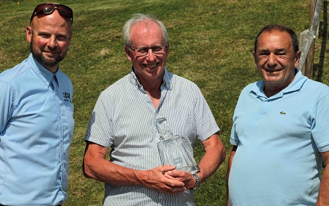 Robert Bayliss (centre) holding his Reesink/Toro decanter with Elliot Wellman of DGM (left) and retired Reesink Turfcare area manager John Pike.