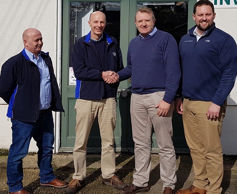 From left to right Mark Stanbridge and Simon Nichols of BFS mark the union with Martin Lishman Ltd with Ian Clayton-Bailey and Joel Capper