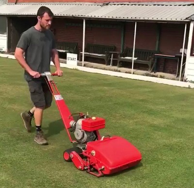 Dan Ashelby giving the Toro Greensmaster, which is thought to have been manufactured in 1971, a one-off outing on a bowling green