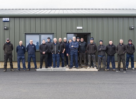 The greenkeeping team outside their new compound