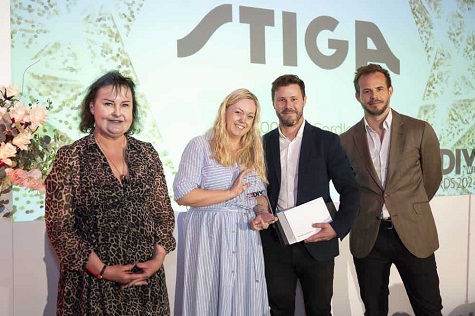 Sam Dixon and Stuart Chick (centre) collected the award of behalf of STIGA