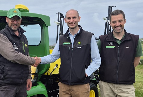 Head greenkeeper, Dan Kendle with Masons Kings' David Barnes and Elliot Prior